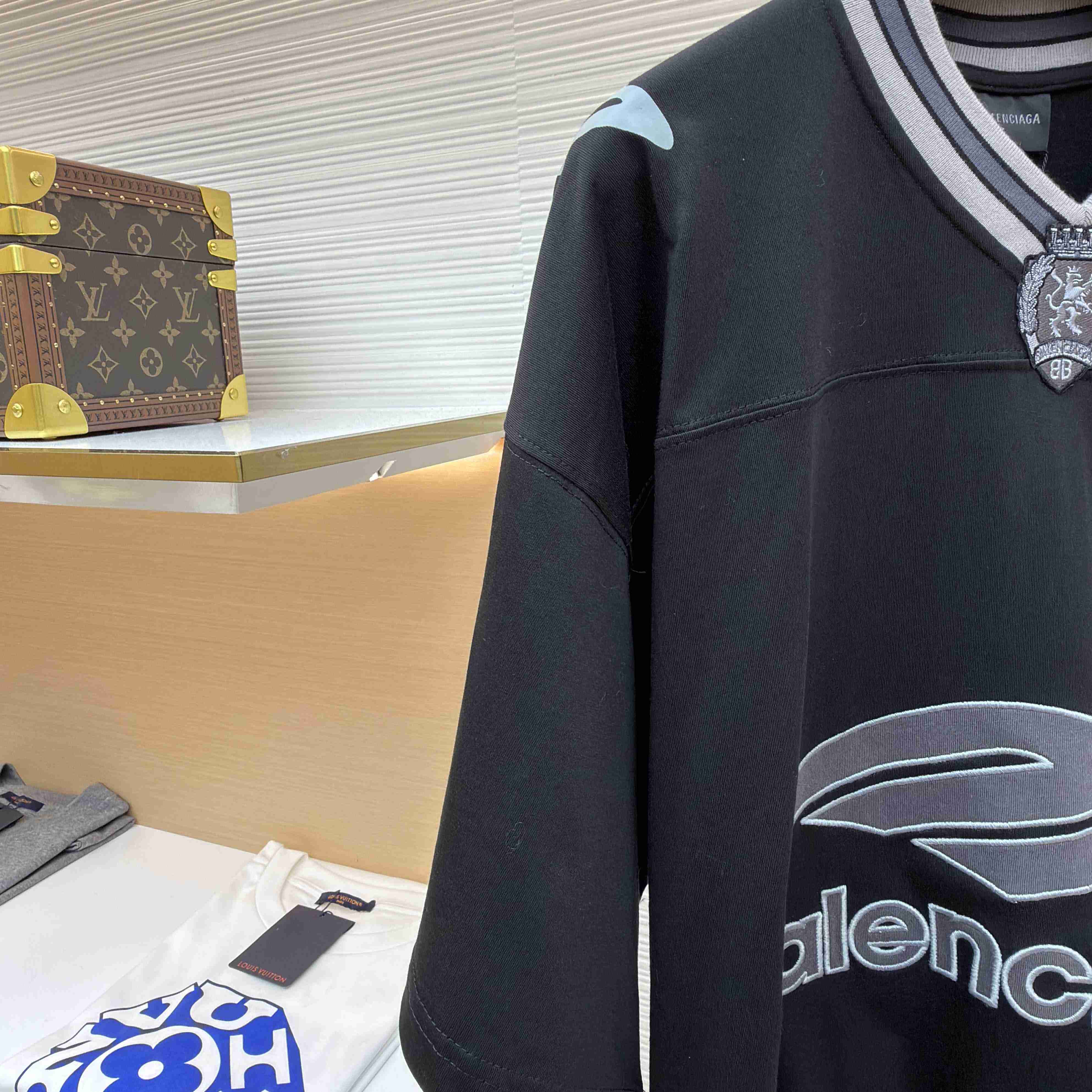 Balenciaga B Football V-Neck T-Shirt Oversized In Black - FashionPlug