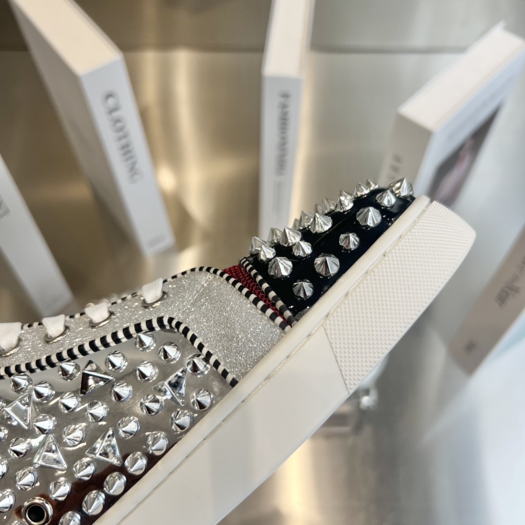 Christian Louboutin High-Top Sneakers - FashionPlug