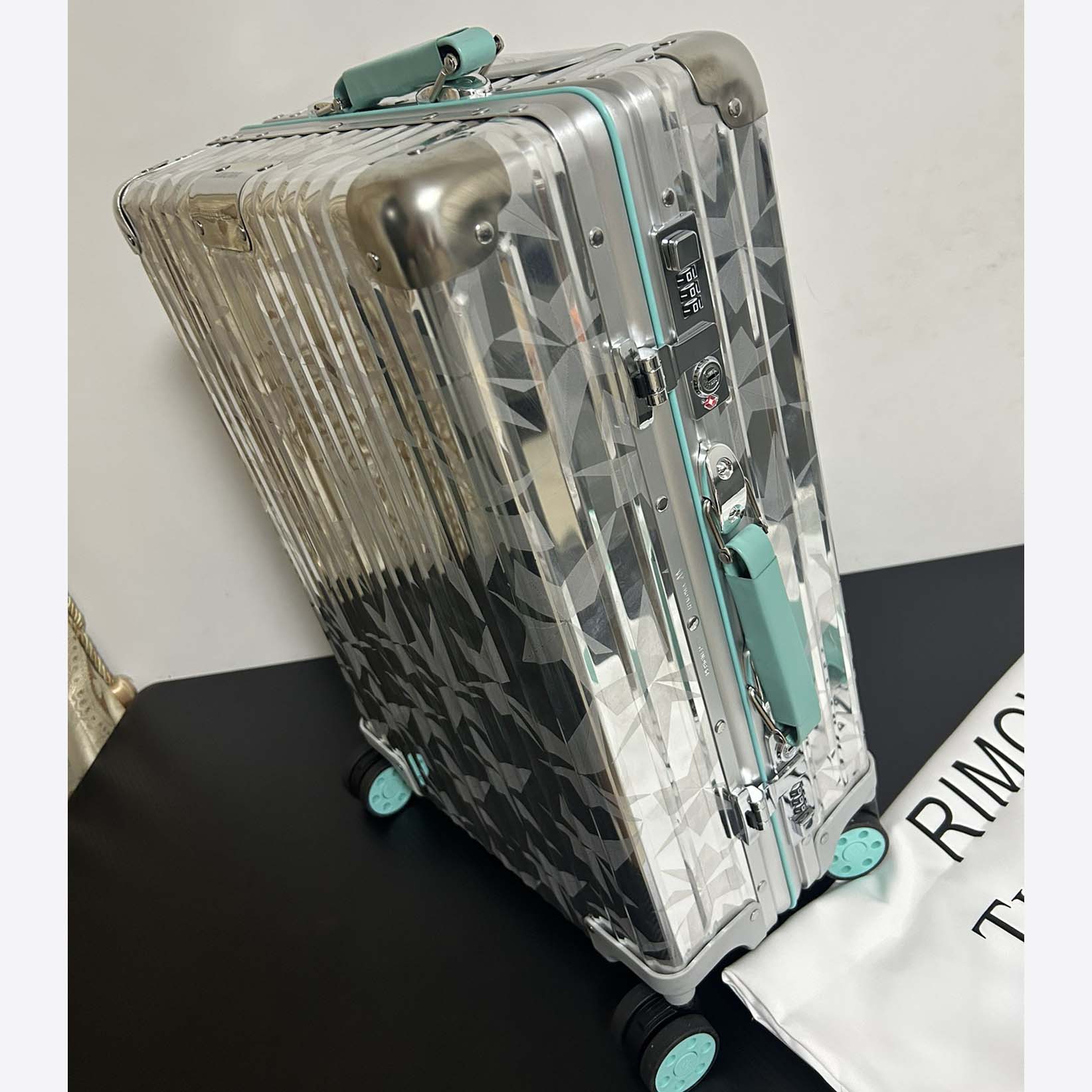 Rimowa x Tiffany&CO Luggage    - FashionPlug