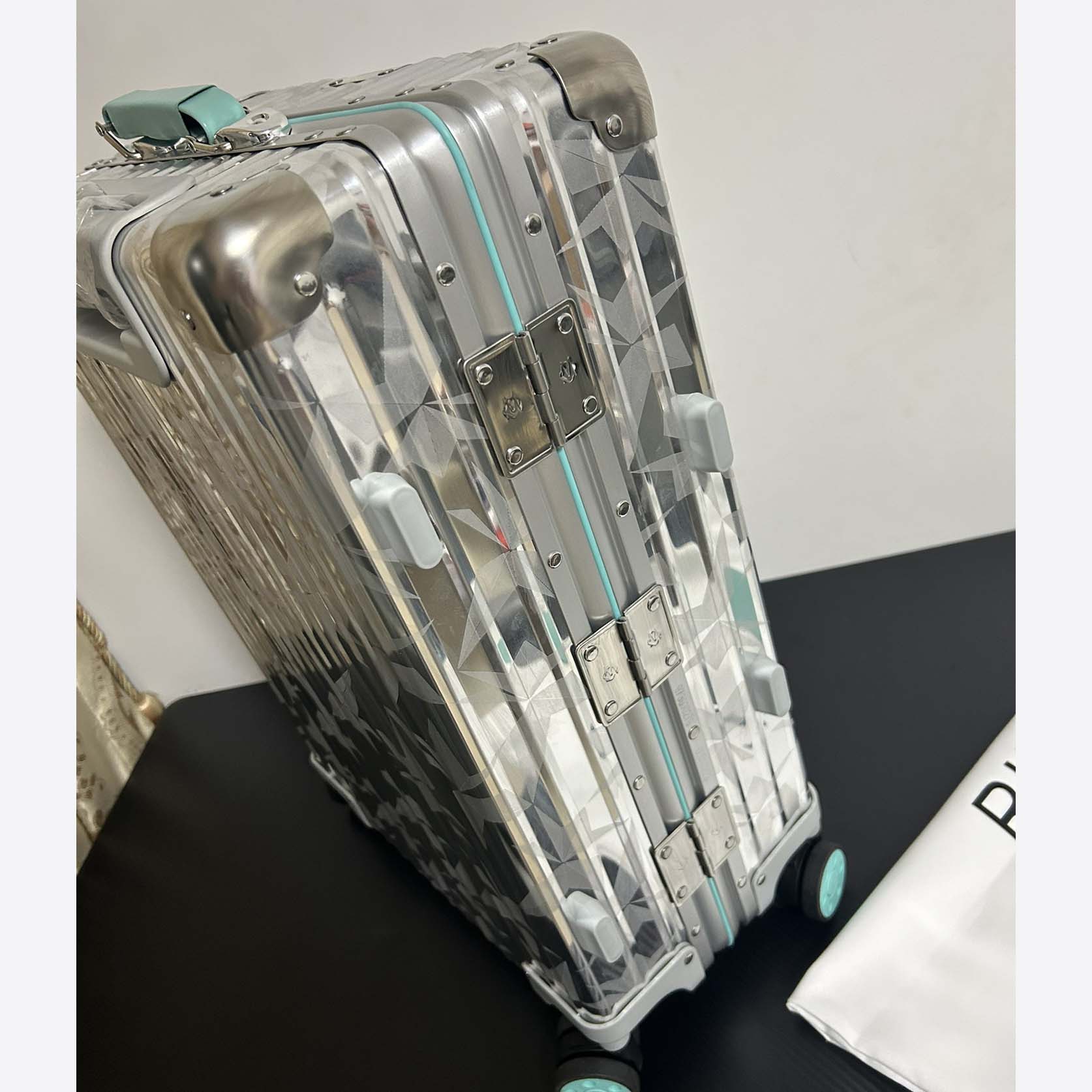 Rimowa x Tiffany&CO Luggage    - FashionPlug