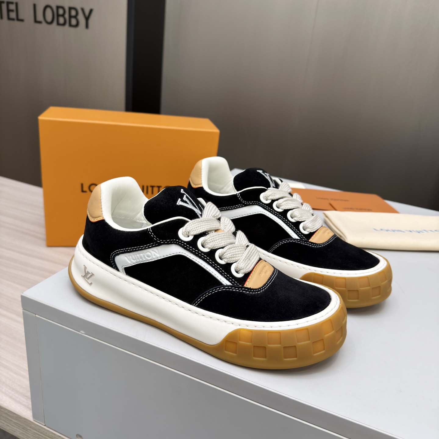 Louis Vuitton LV Tilted Sneaker  - FashionPlug