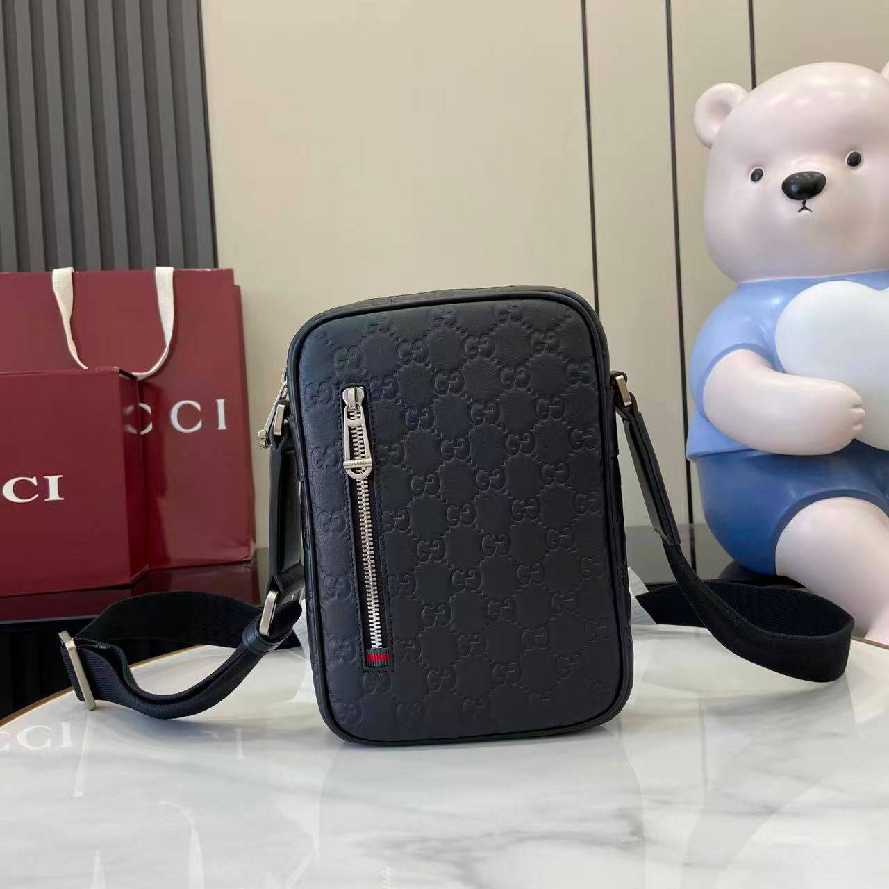 Gucci GG Emblem Small Crossbody Bag 850238 - FashionPlug