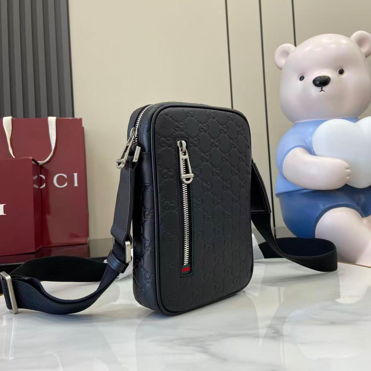 Gucci GG Emblem Small Crossbody Bag 850238 - FashionPlug