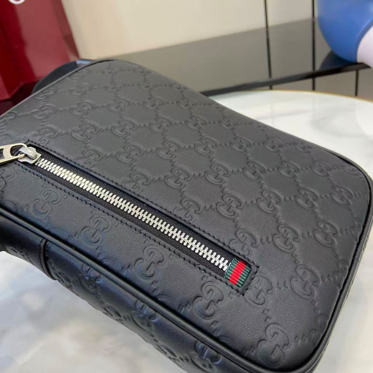 Gucci GG Emblem Small Crossbody Bag 850238 - FashionPlug