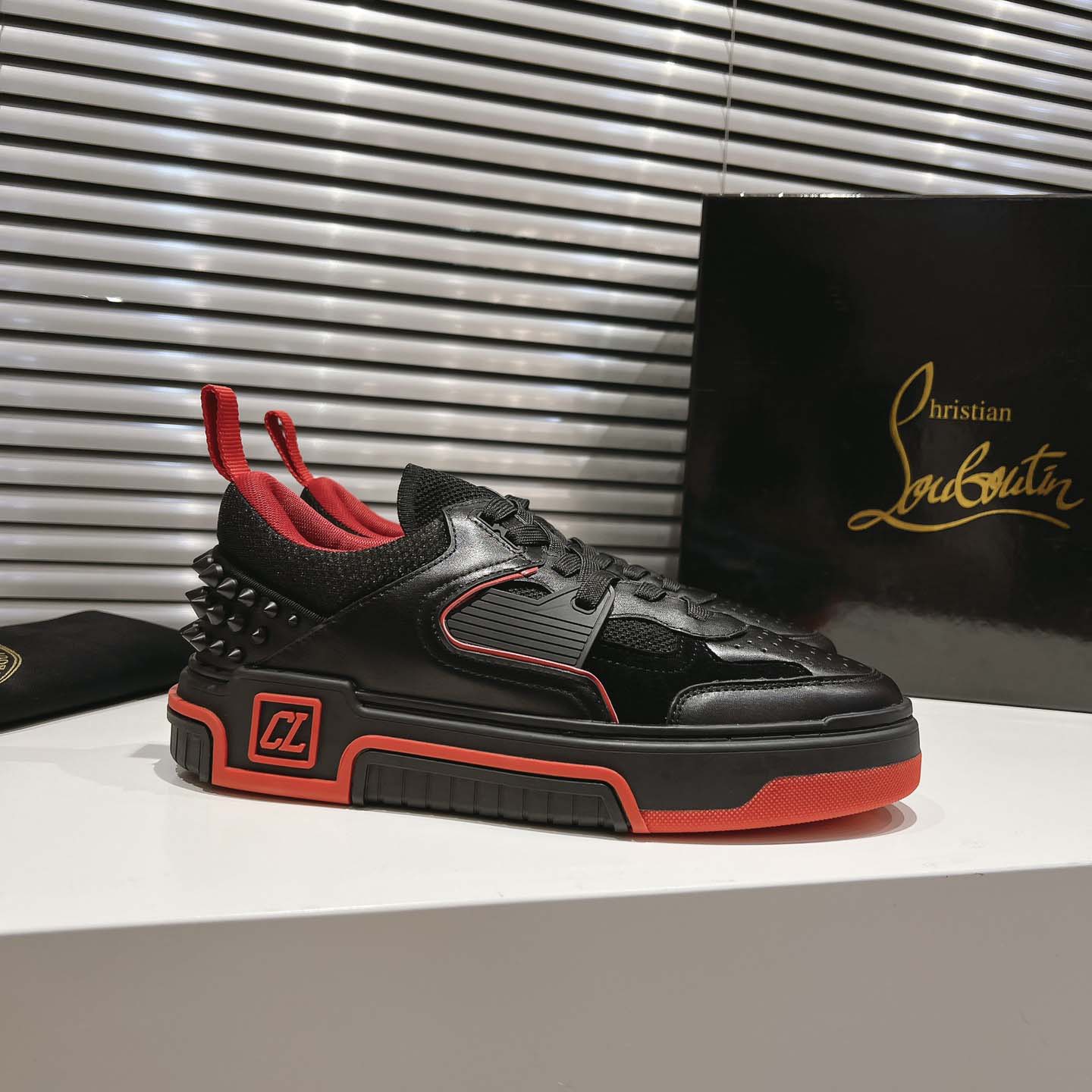 Christian Louboutin Astroloubi Leather Sneakers - FashionPlug