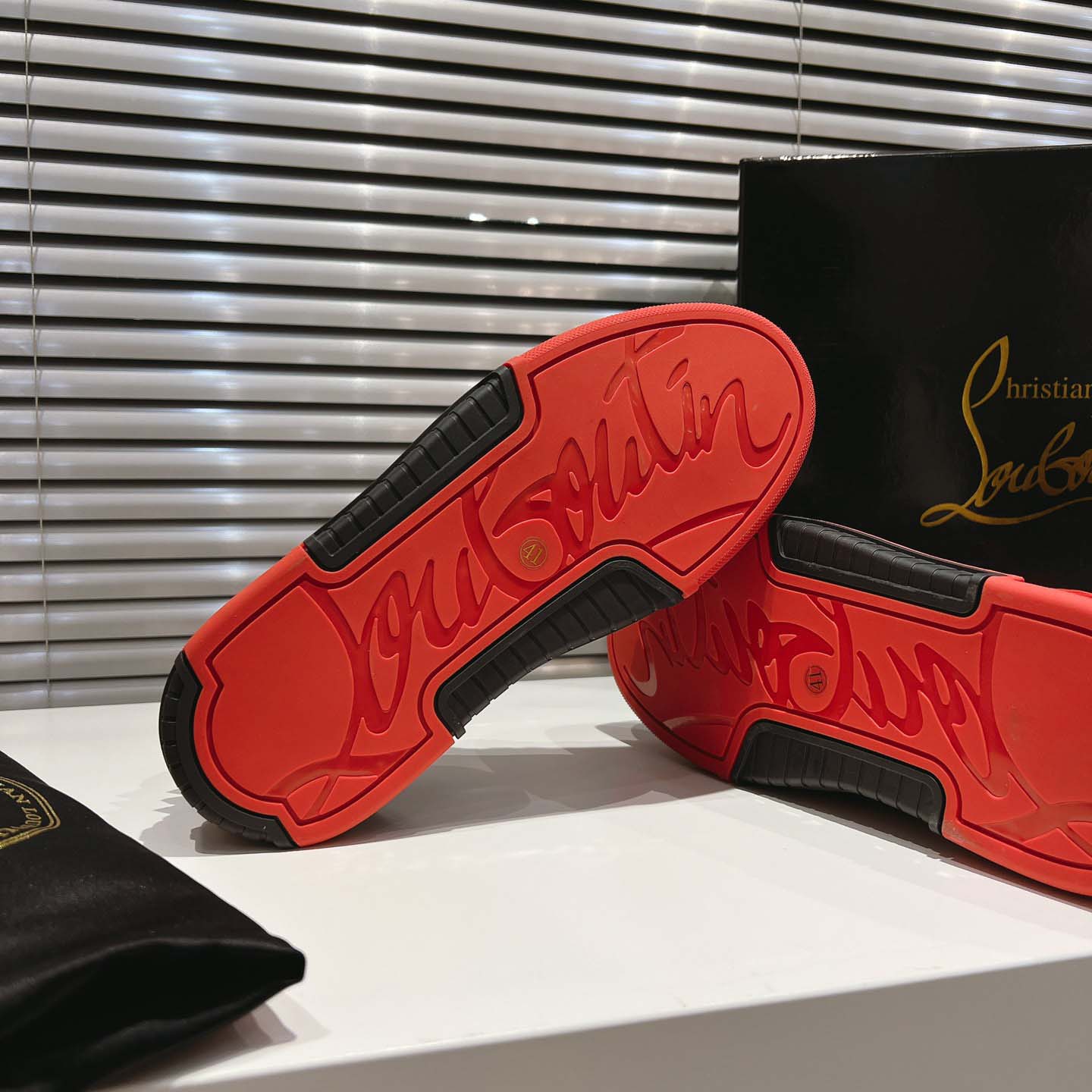 Christian Louboutin Astroloubi Leather Sneakers - FashionPlug