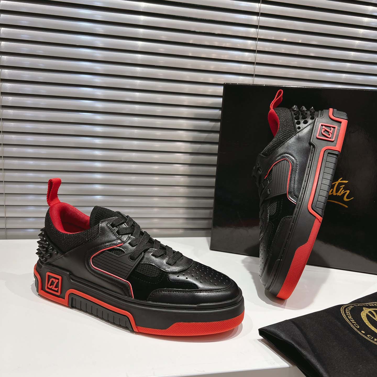 Christian Louboutin Astroloubi Leather Sneakers - FashionPlug
