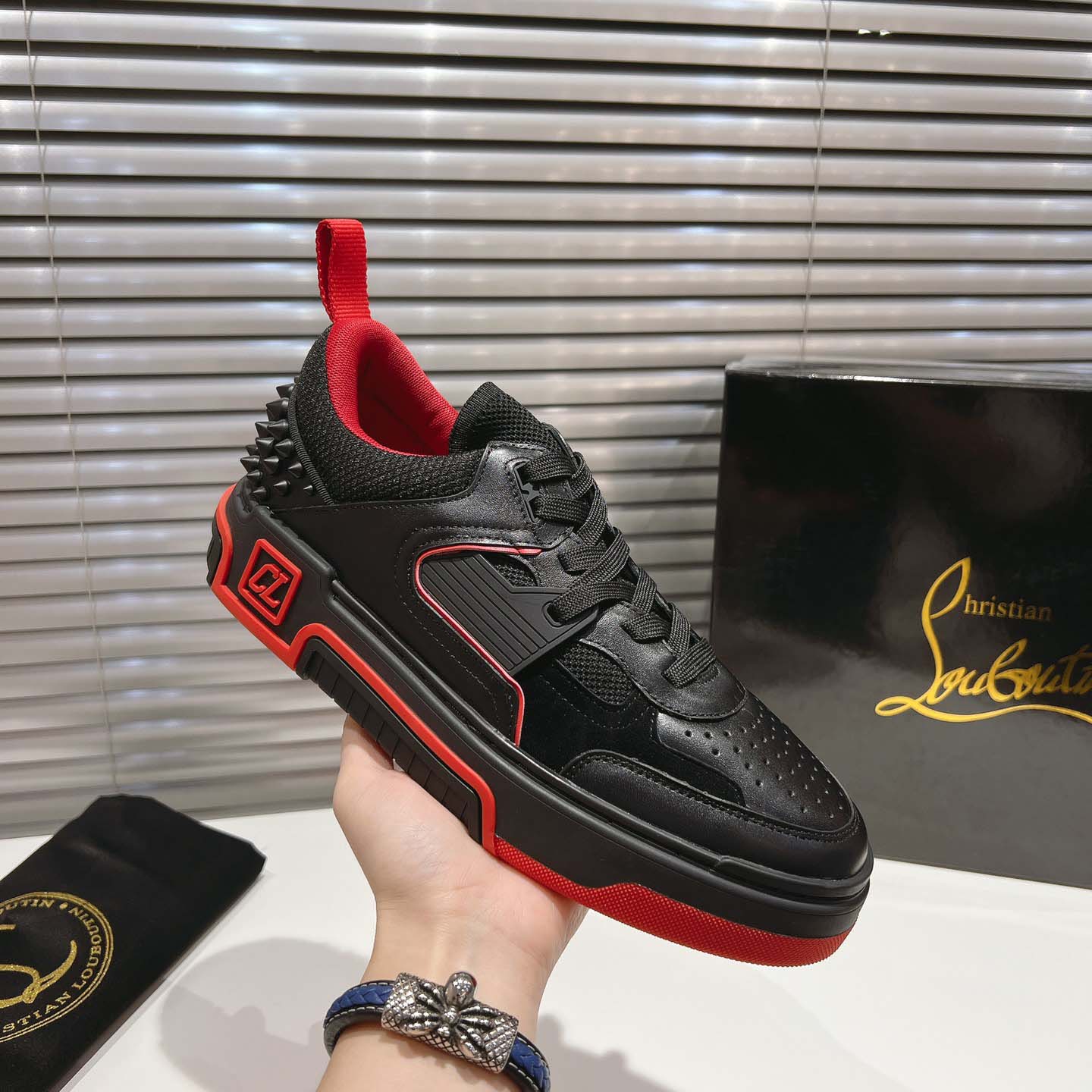 Christian Louboutin Astroloubi Leather Sneakers - FashionPlug
