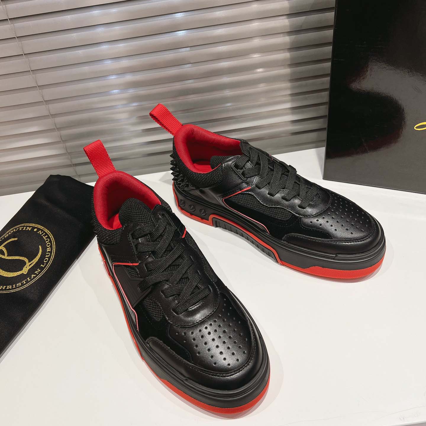 Christian Louboutin Astroloubi Leather Sneakers - FashionPlug