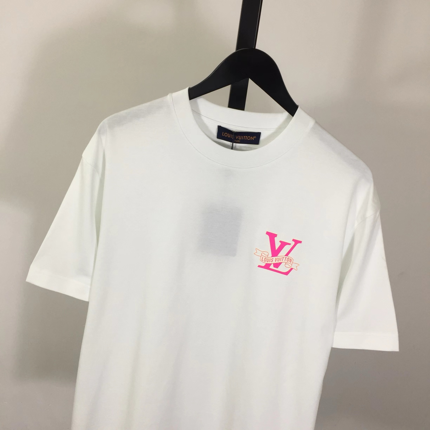 Louis Vuitton Cotton T-shirt Featuring Pink LV Logo Graphic On The Chest - FashionPlug