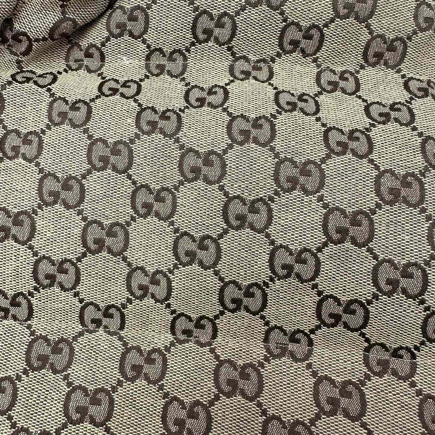 Gucci GG Canvas Puffer Jacket - FashionPlug