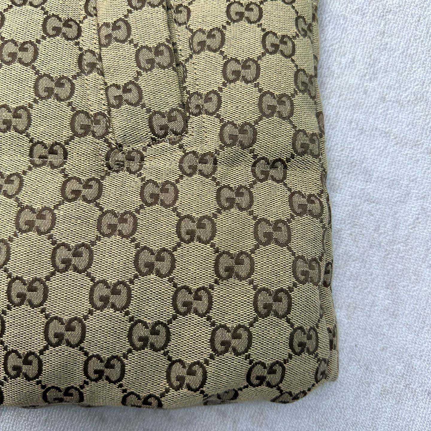 Gucci GG Canvas Puffer Jacket - FashionPlug