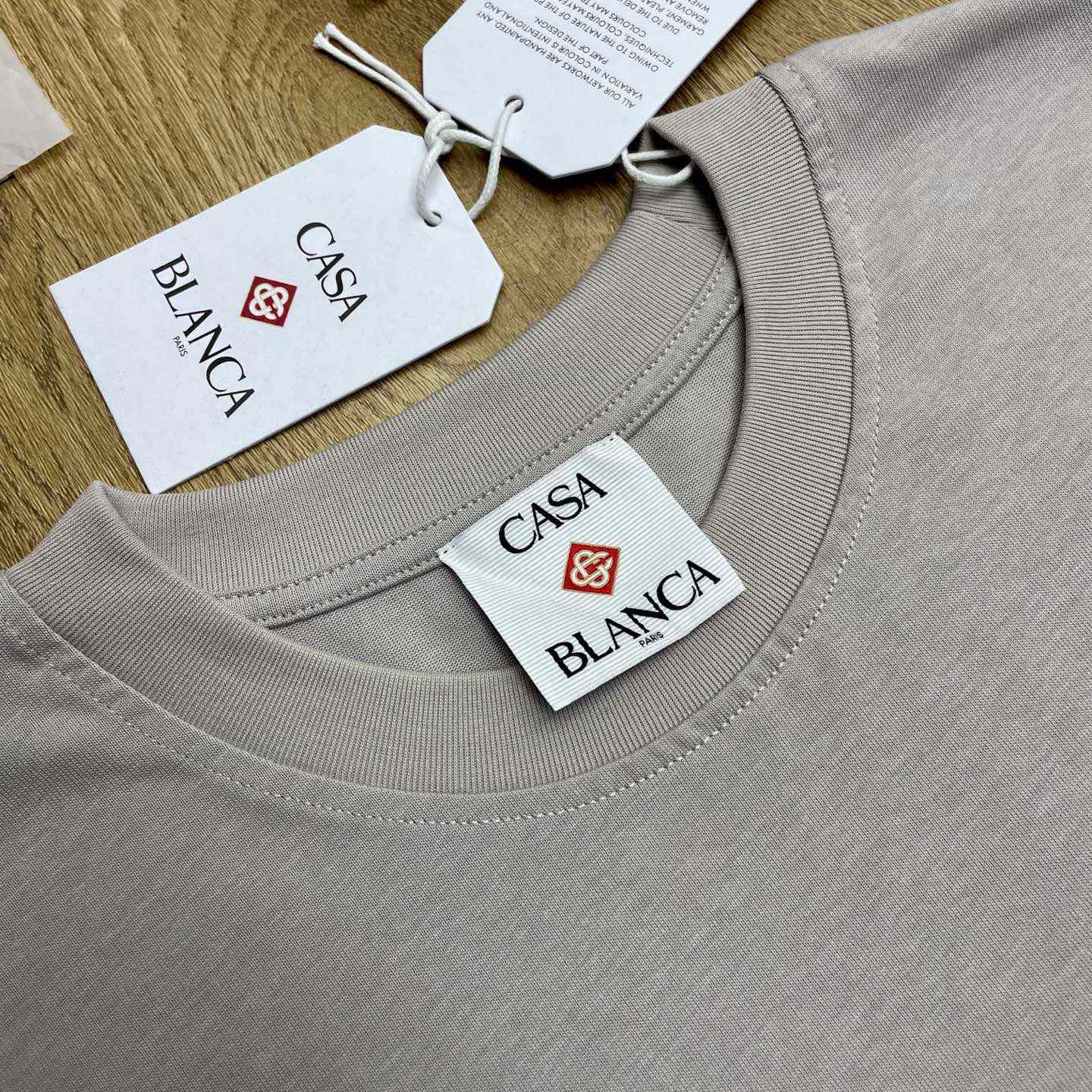 Casablanca FLAMING TENNIS BALL OVERSIZED SHORT SLEEVE T‑SHIRT C1115 - FashionPlug