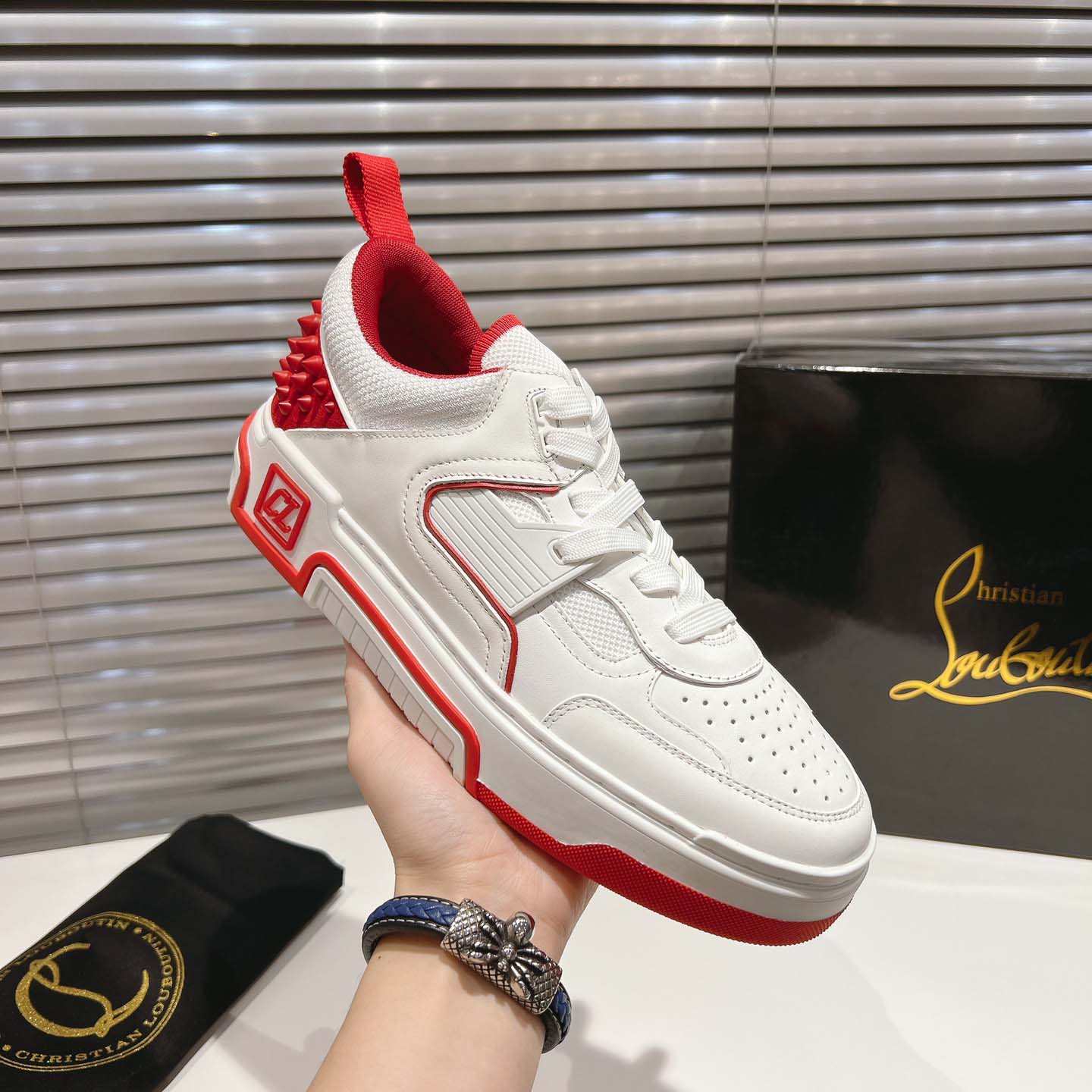 Christian Louboutin Astroloubi Leather Sneakers - FashionPlug