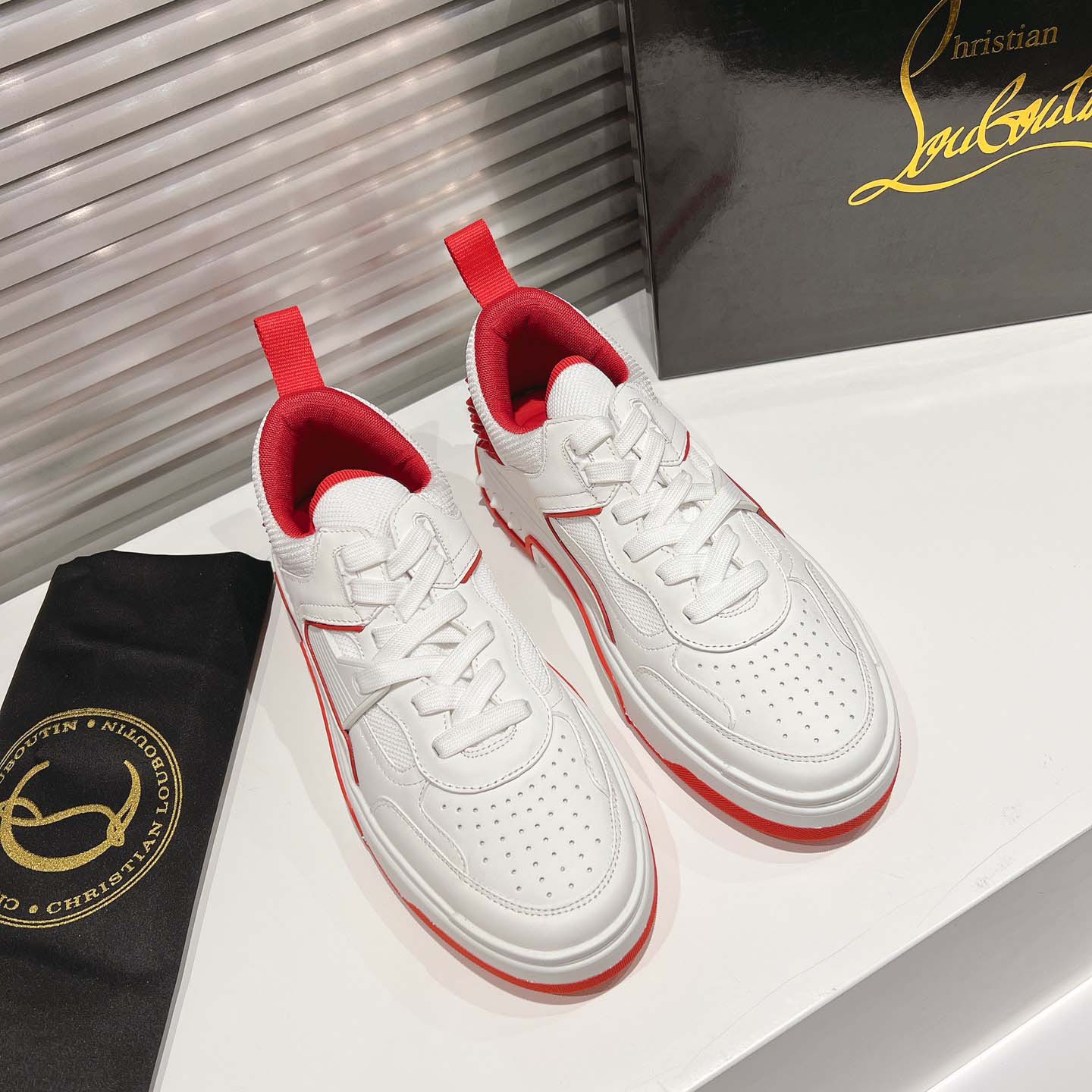 Christian Louboutin Astroloubi Leather Sneakers - FashionPlug