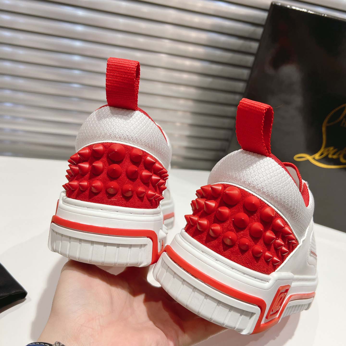 Christian Louboutin Astroloubi Leather Sneakers - FashionPlug