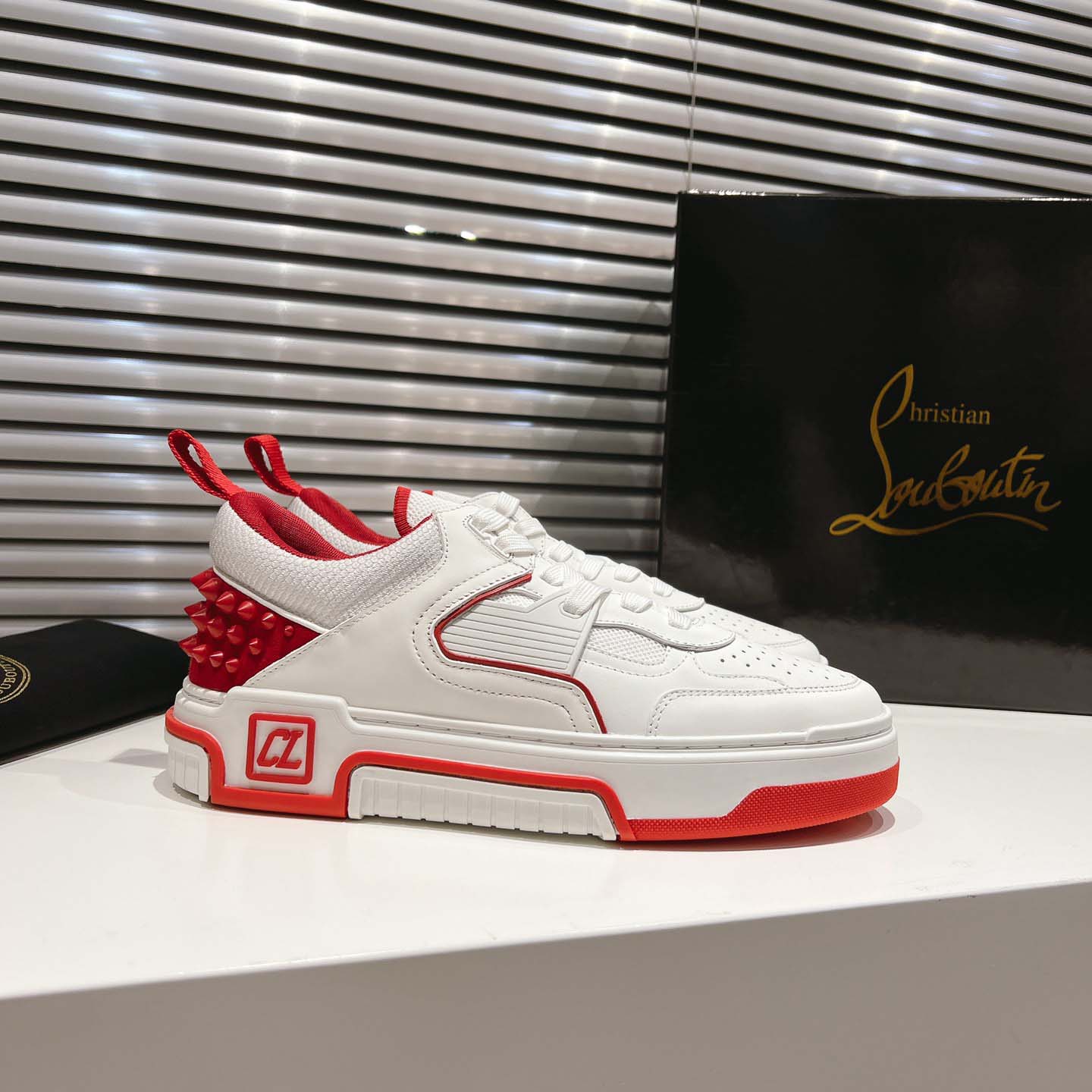 Christian Louboutin Astroloubi Leather Sneakers - FashionPlug