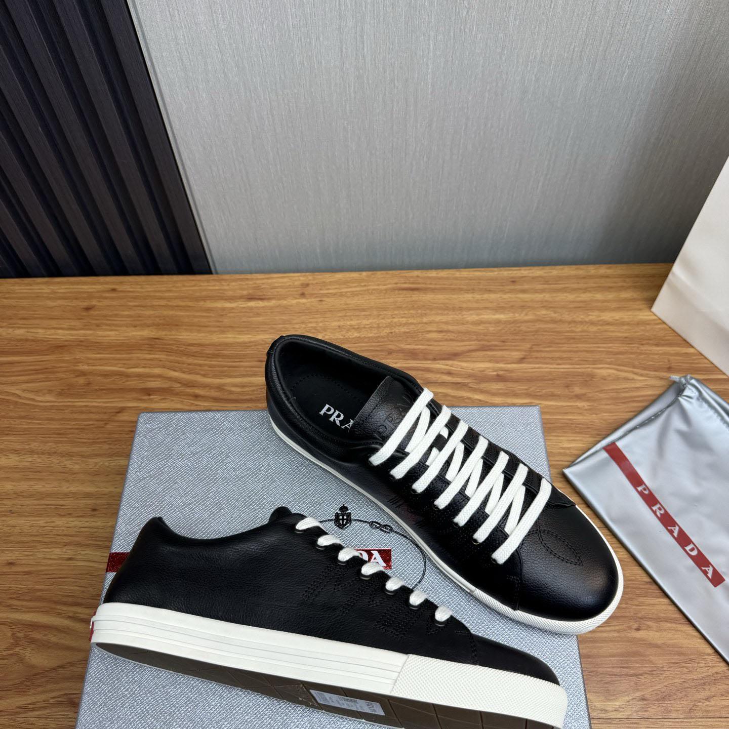 Prada Aged-Effect Lace-Up Low-Top Sneakers - FashionPlug