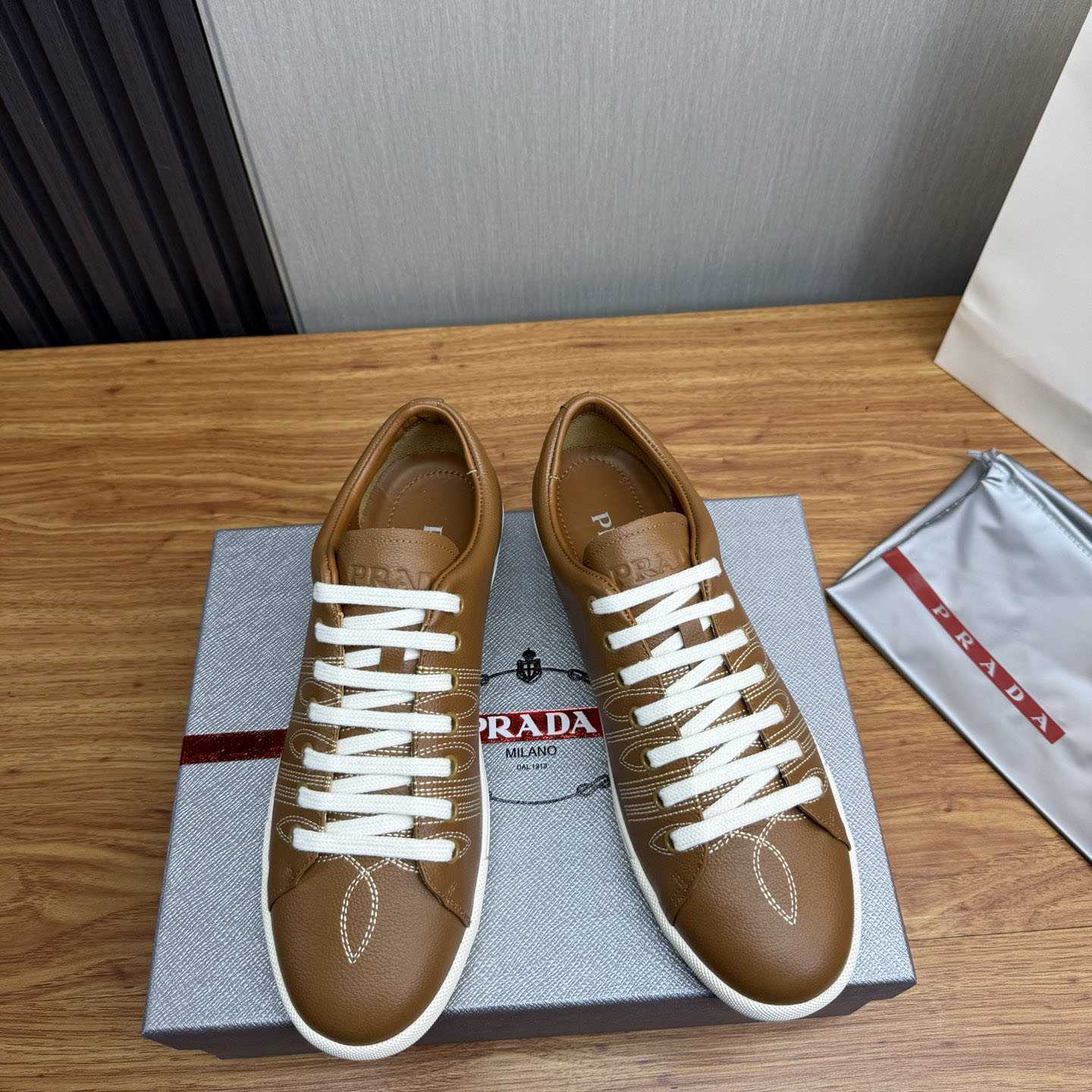 Prada Decorative-Stitching Leather Low-Top Sneakers - FashionPlug