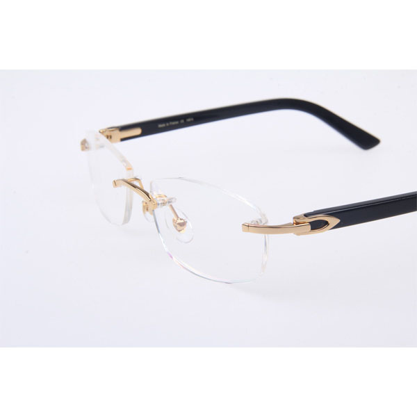 Cartier CT 5952143 Eyeglasses In Gold With Black Arms - FashionPlug