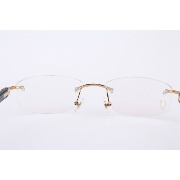 Cartier CT 5952143 Eyeglasses In Gold With Black Arms - FashionPlug