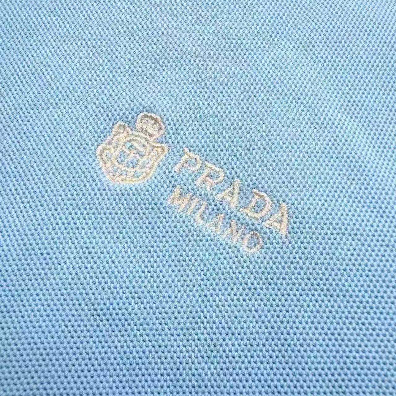 Prada Logo-appliqué Polo Shirt - FashionPlug