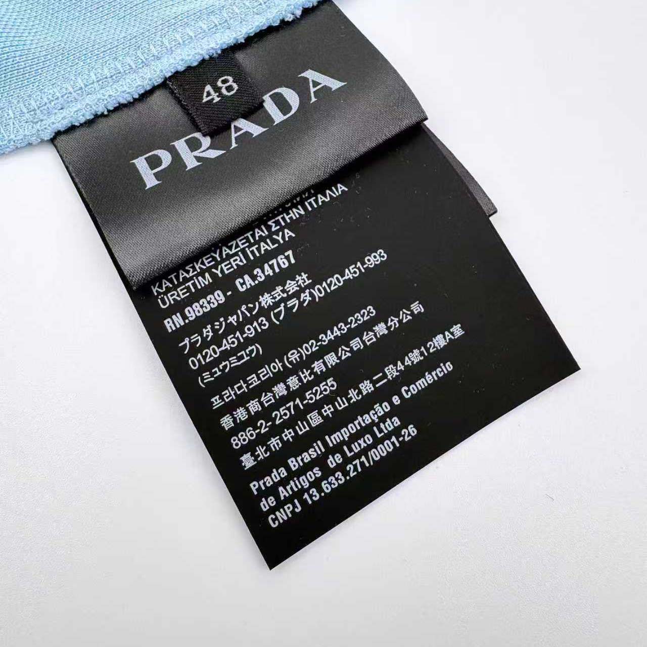 Prada Logo-appliqué Polo Shirt - FashionPlug