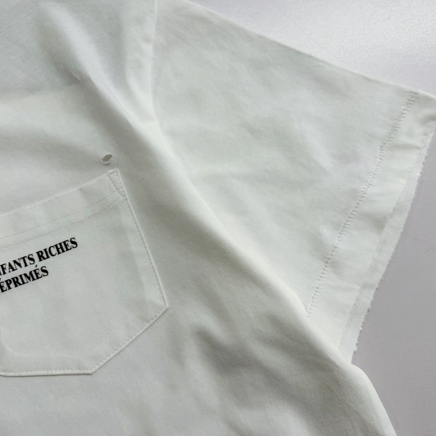 Enfants Riches Déprimés  Distressed Logo-Print Cotton-Jersey T-Shirt - White - FashionPlug
