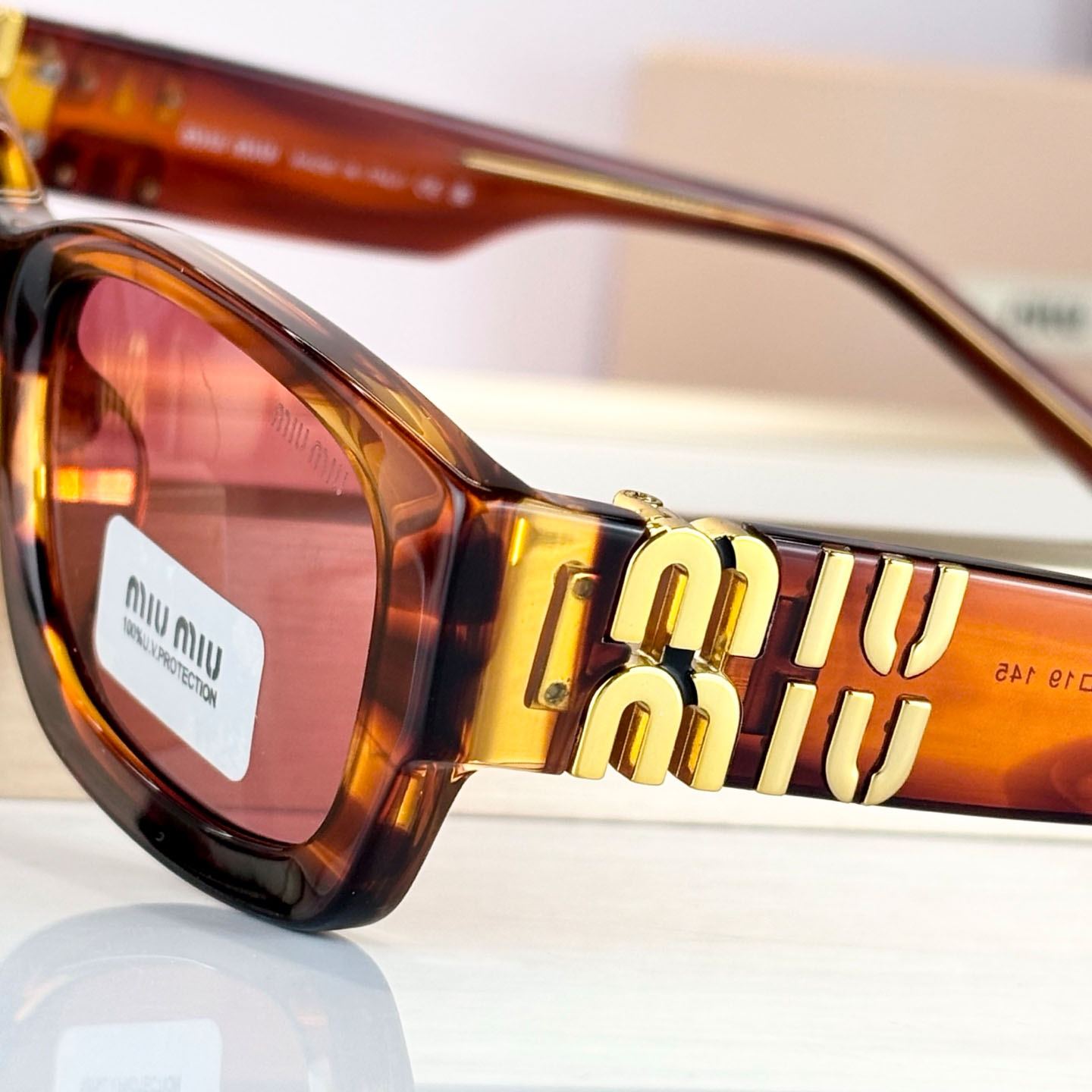 Miu Miu MU B13S Sunglasses - FashionPlug