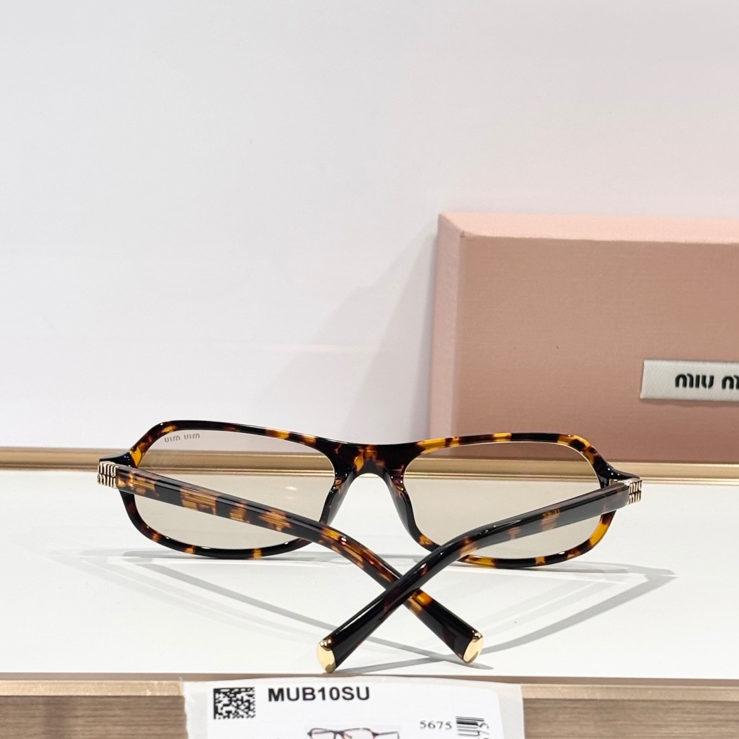 Miu Miu Sunglasses - FashionPlug