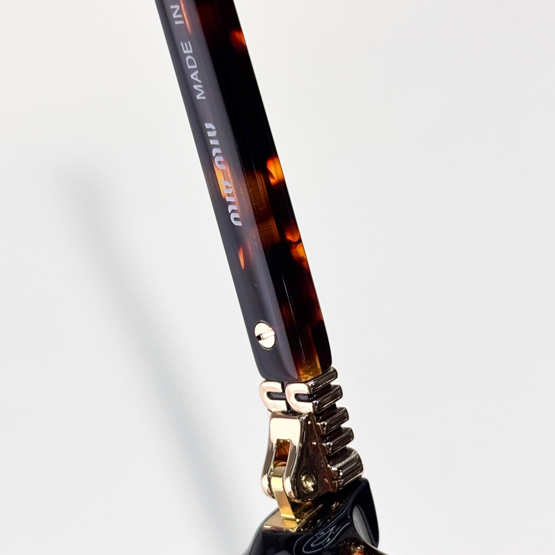 Miu Miu Sunglasses - FashionPlug