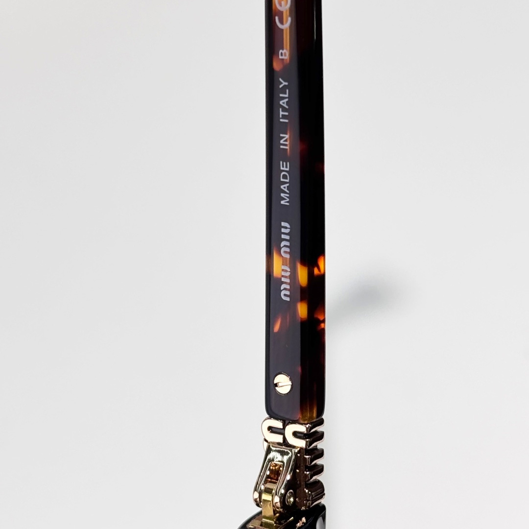 Miu Miu Sunglasses - FashionPlug