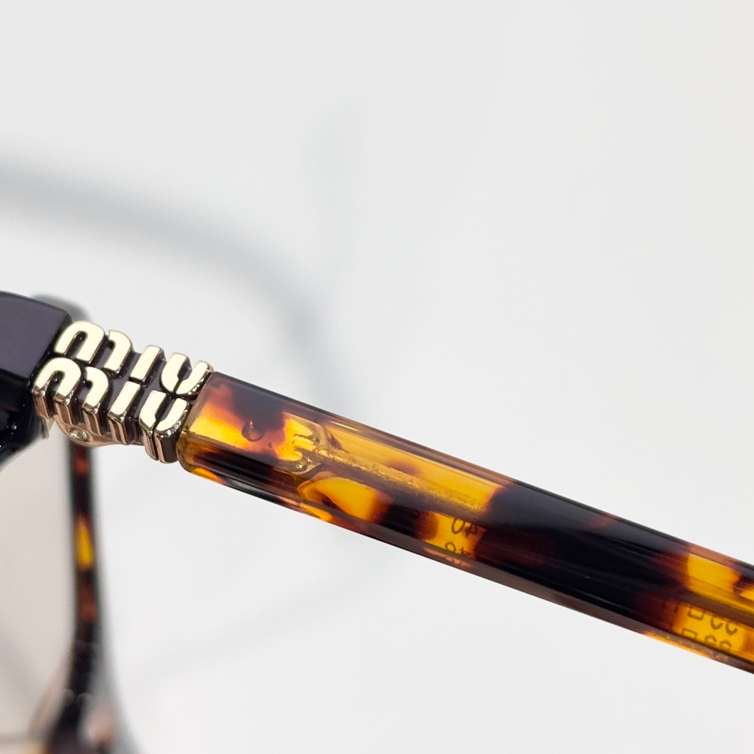 Miu Miu Sunglasses - FashionPlug