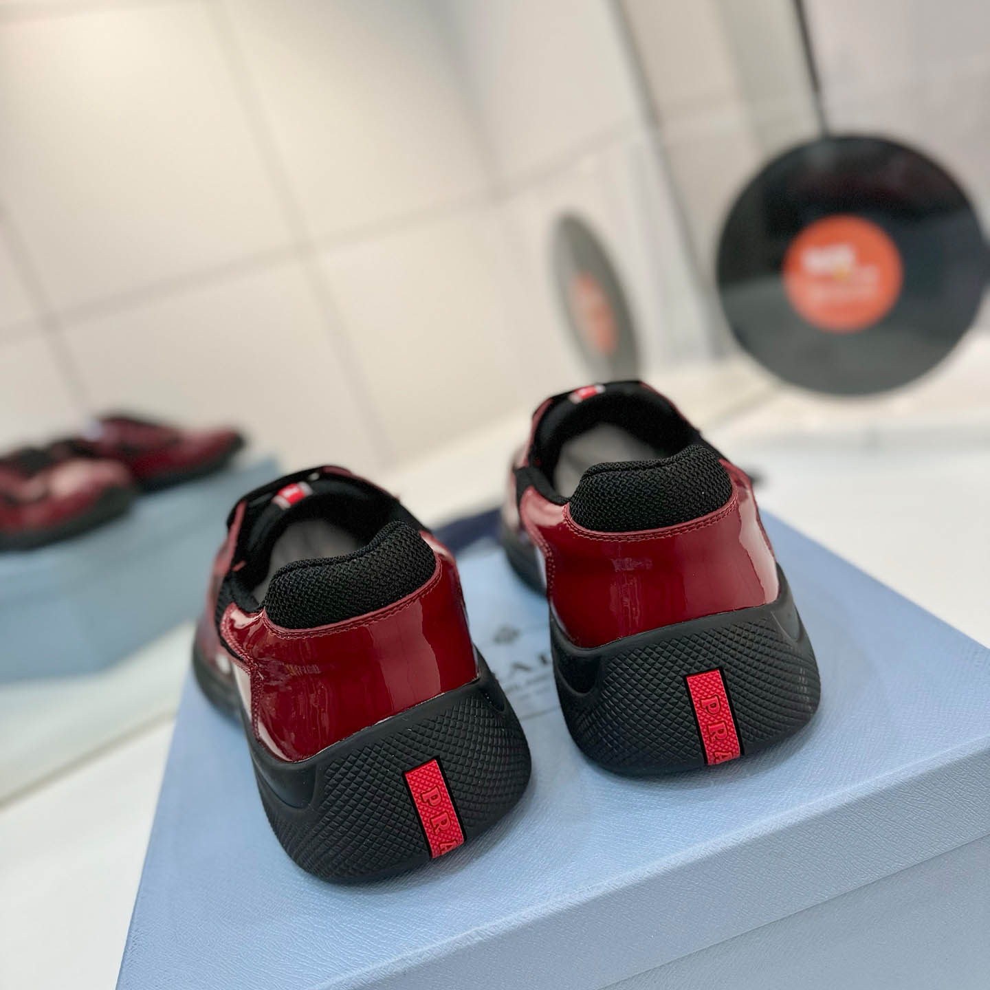 Prada america's Cup Patent Leather Sneakers - FashionPlug