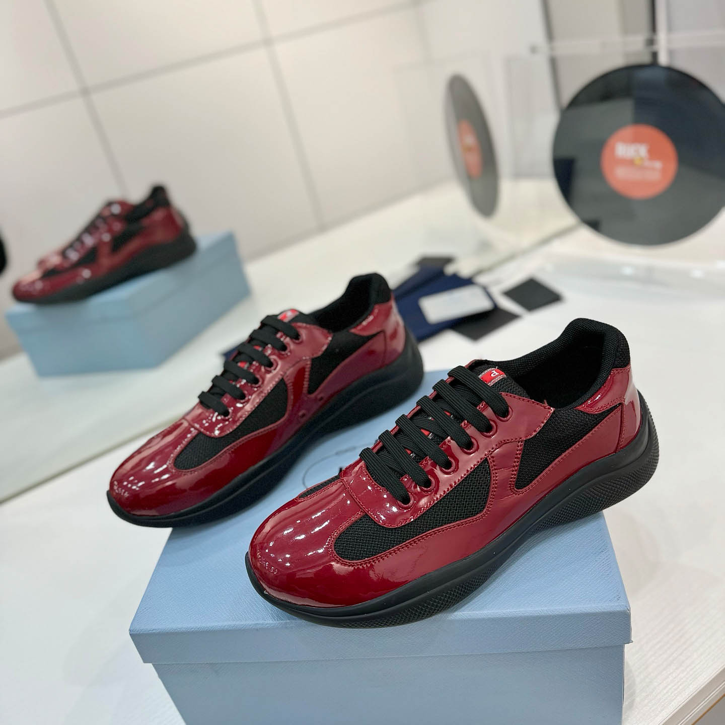 Prada america's Cup Patent Leather Sneakers - FashionPlug