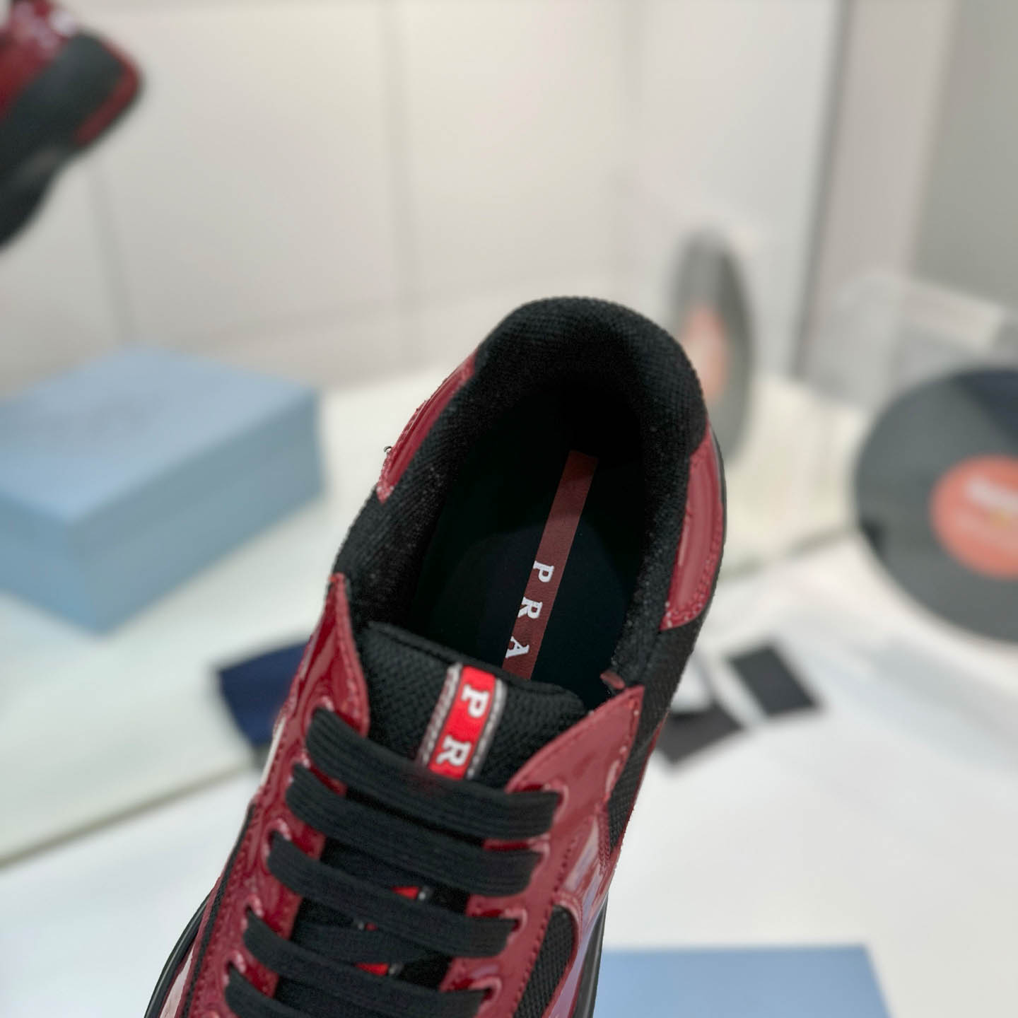 Prada america's Cup Patent Leather Sneakers - FashionPlug