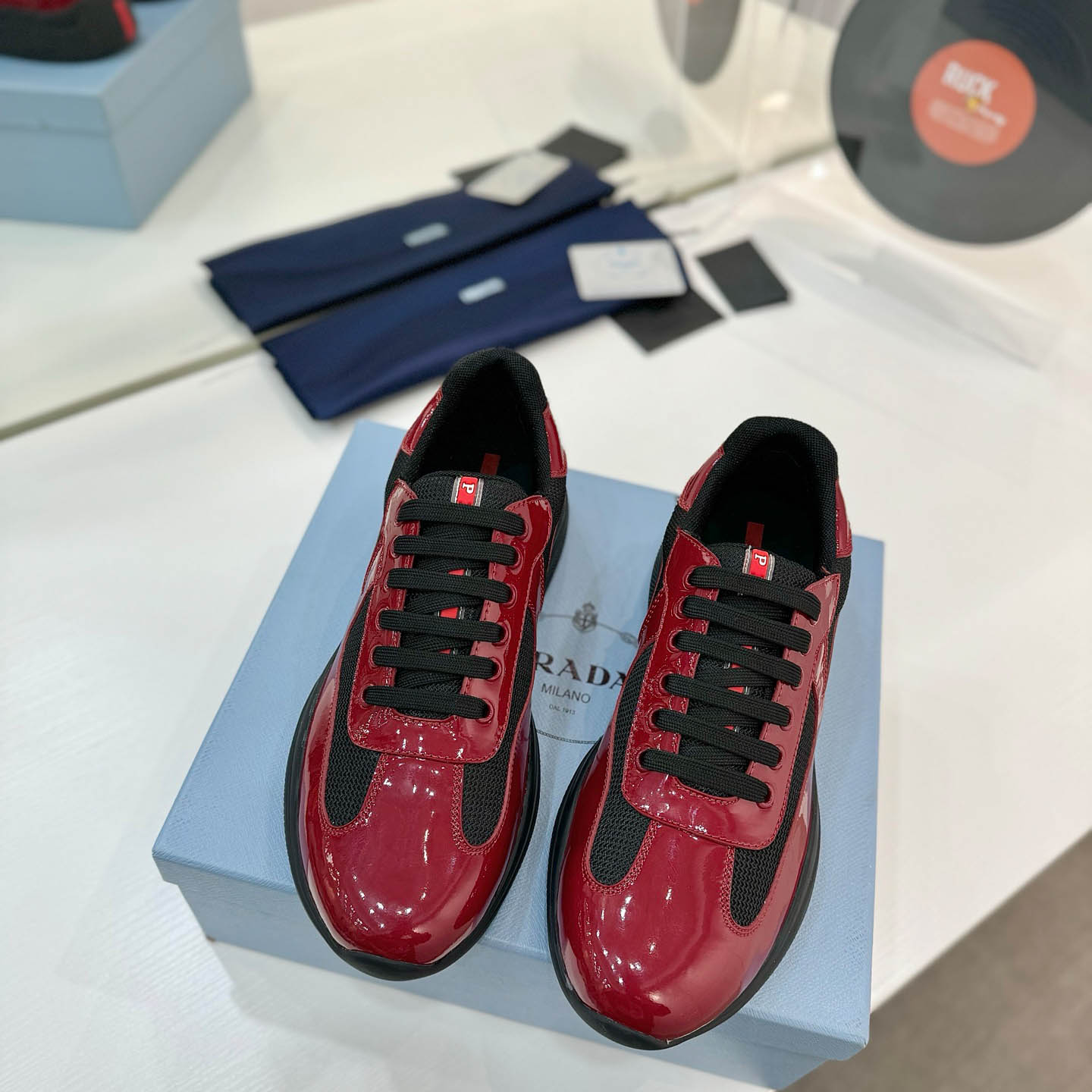 Prada america's Cup Patent Leather Sneakers - FashionPlug