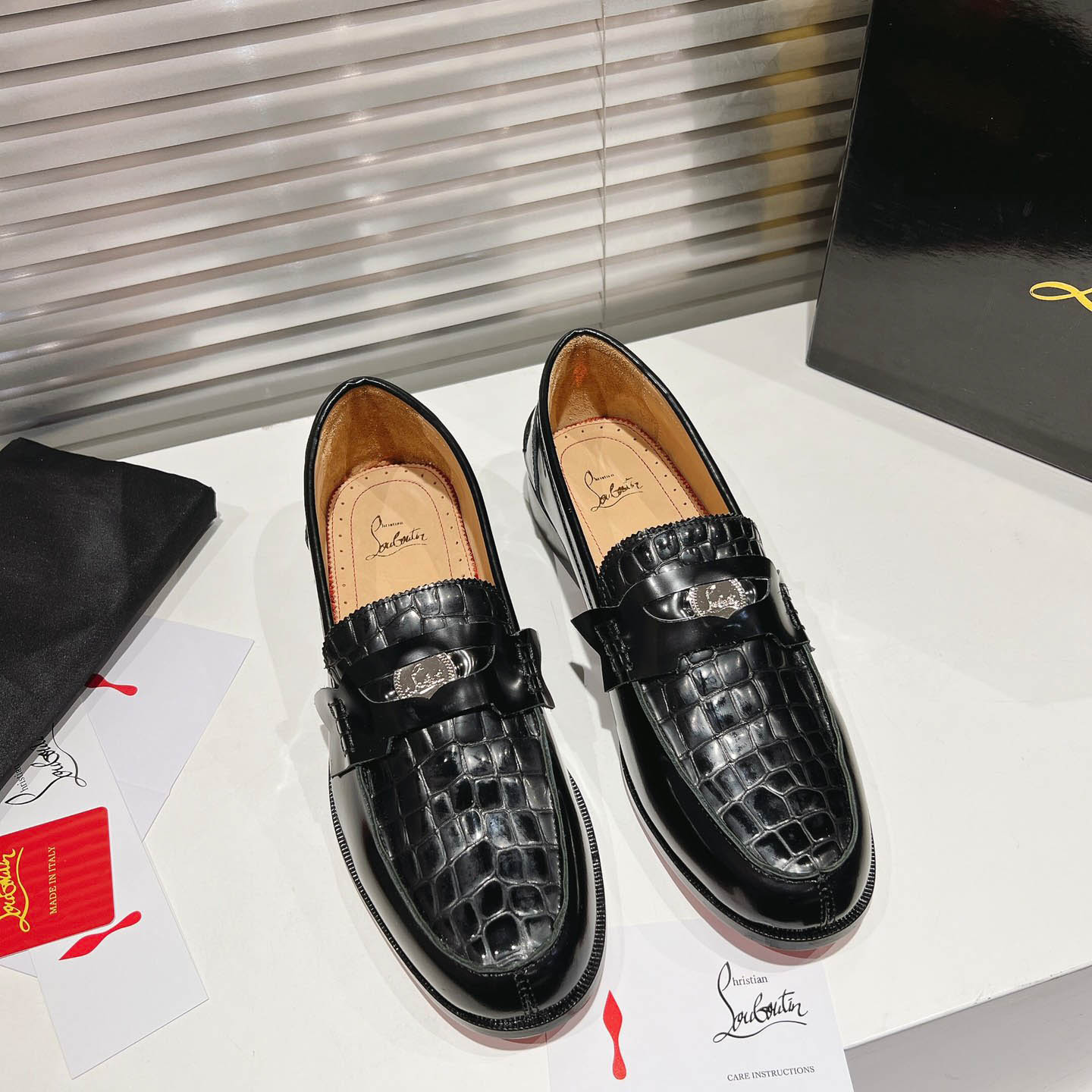 Christian Louboutin Chambelimoc Alligator-Print Embossed Loafers - FashionPlug