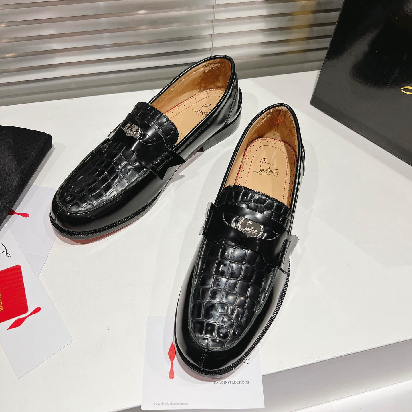 Christian Louboutin Chambelimoc Alligator-Print Embossed Loafers - FashionPlug