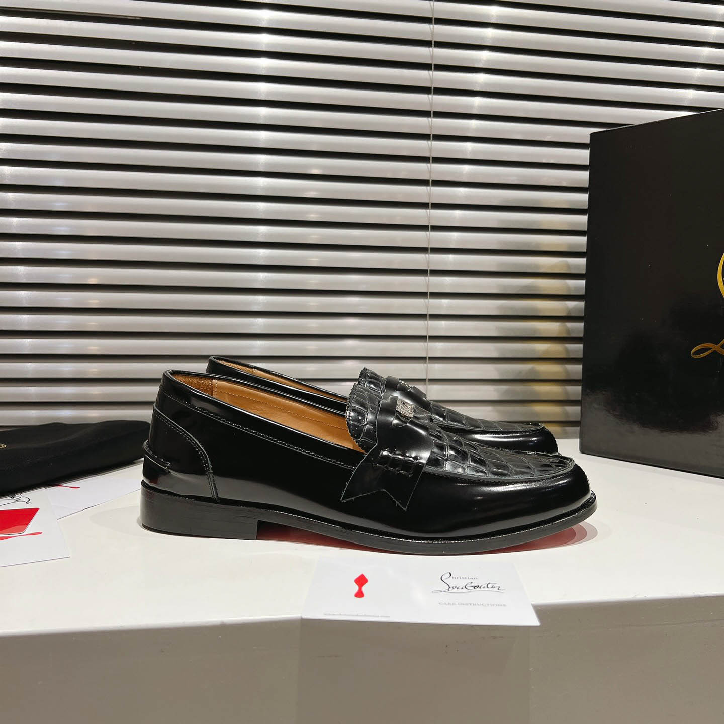 Christian Louboutin Chambelimoc Alligator-Print Embossed Loafers - FashionPlug
