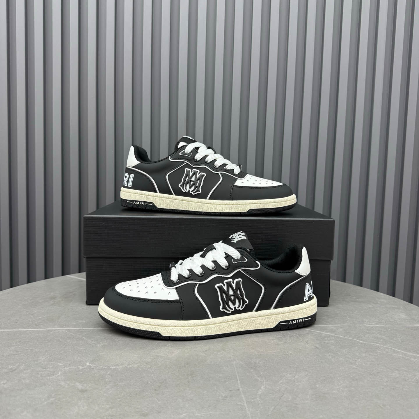 Amiri Black & White Newport Sneakers - FashionPlug