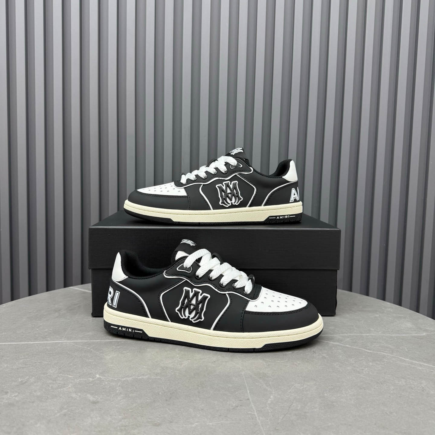 Amiri Black & White Newport Sneakers - FashionPlug