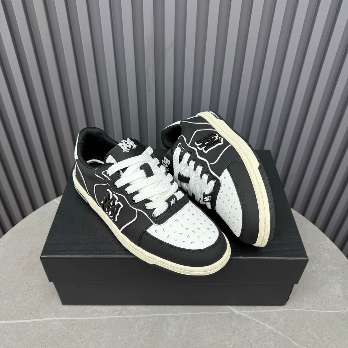 Amiri Black & White Newport Sneakers - FashionPlug