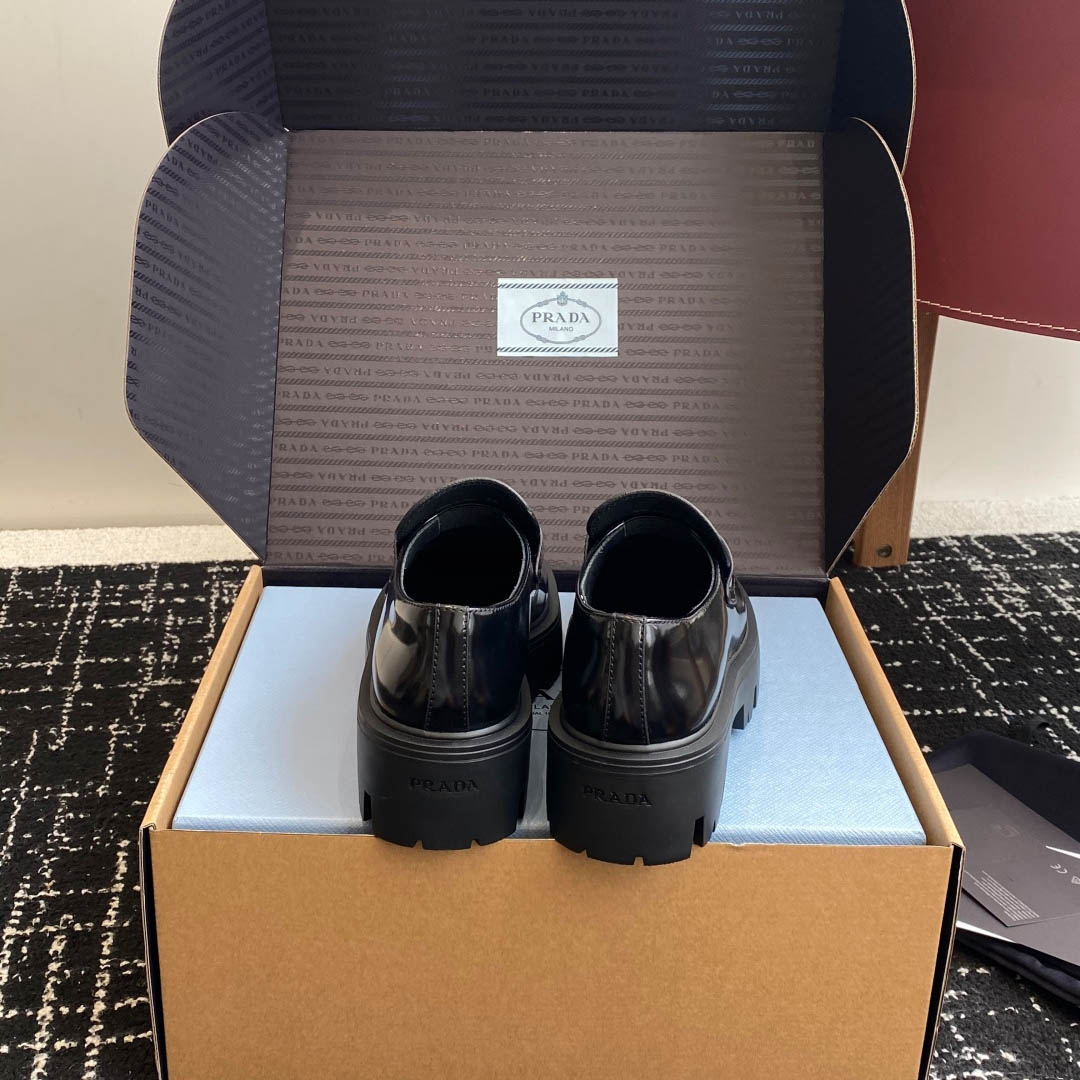Prada Brushed Leather Loafers - FashionPlug