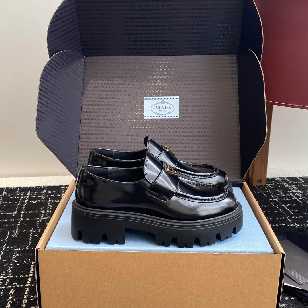 Prada Brushed Leather Loafers - FashionPlug