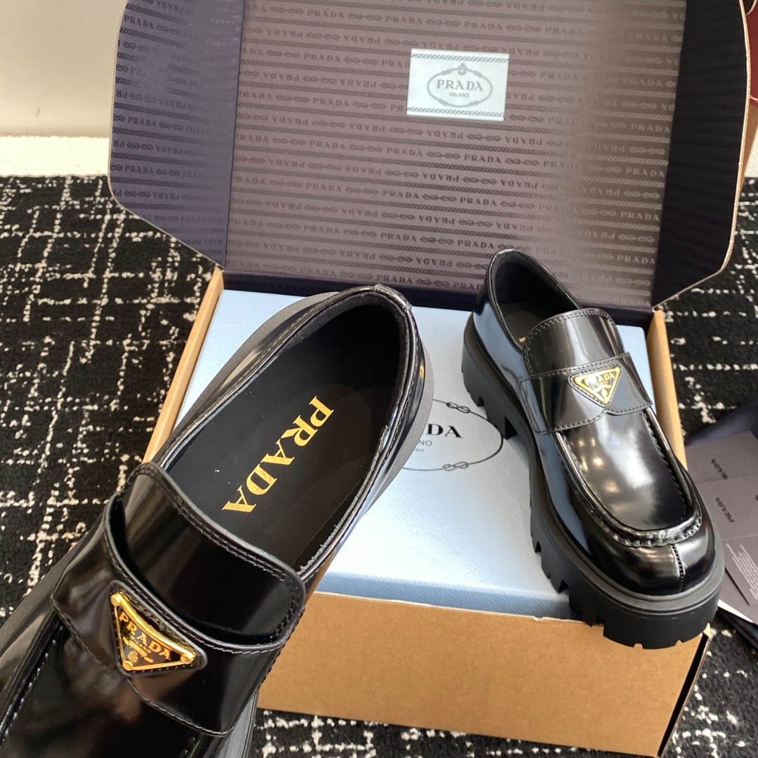 Prada Brushed Leather Loafers - FashionPlug