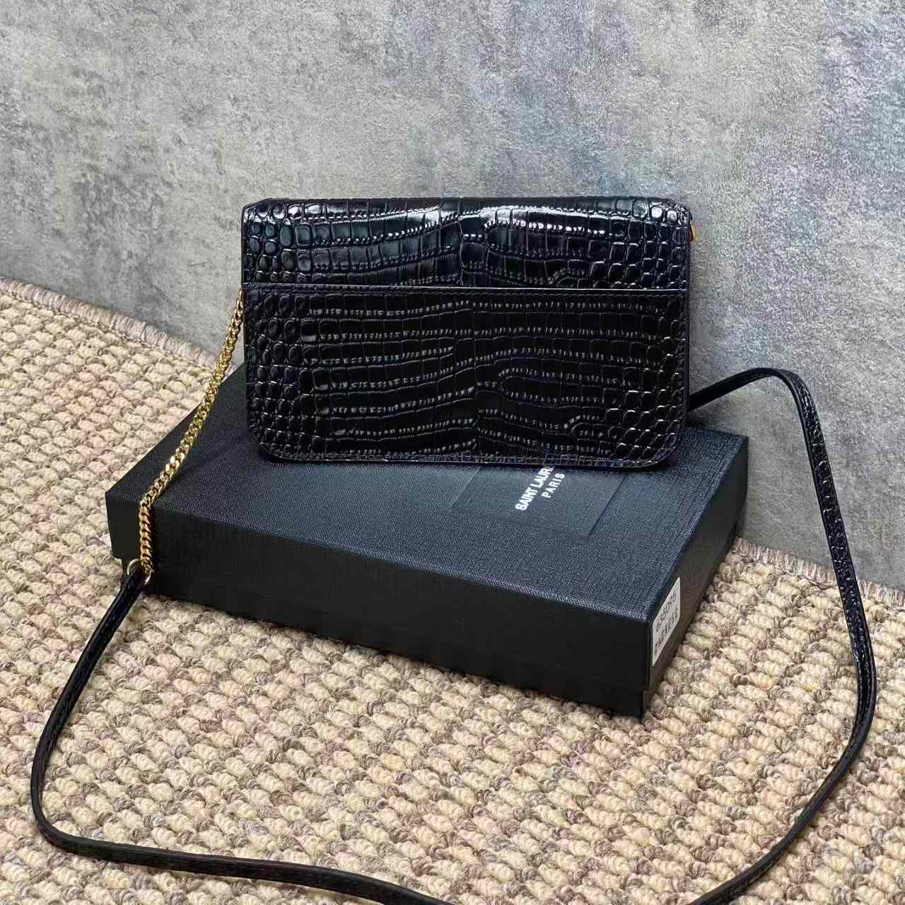 Saint Laurent CASSANDRE Phone Holder In SHINY Crocodile-Embossed Leather - FashionPlug