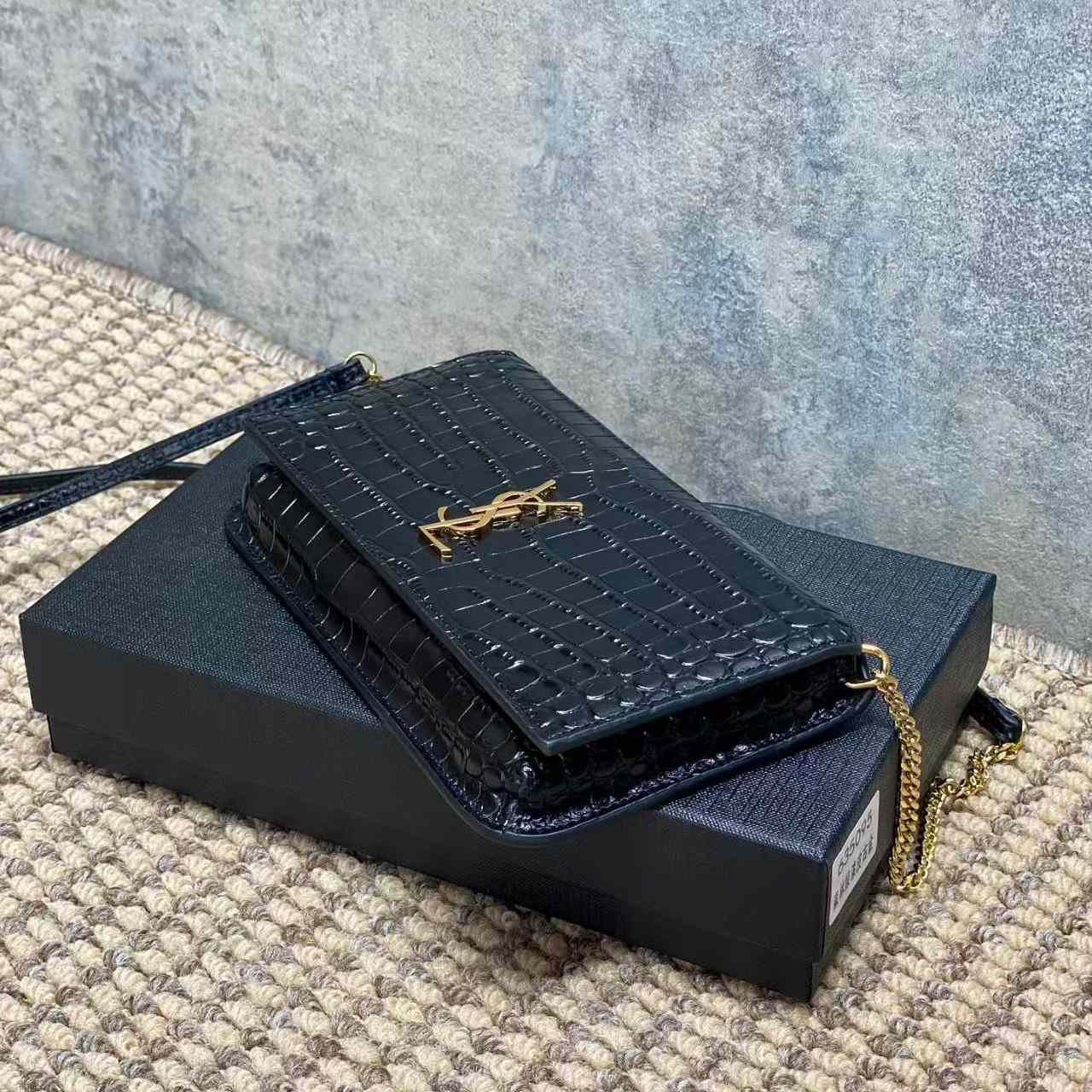 Saint Laurent CASSANDRE Phone Holder In SHINY Crocodile-Embossed Leather - FashionPlug