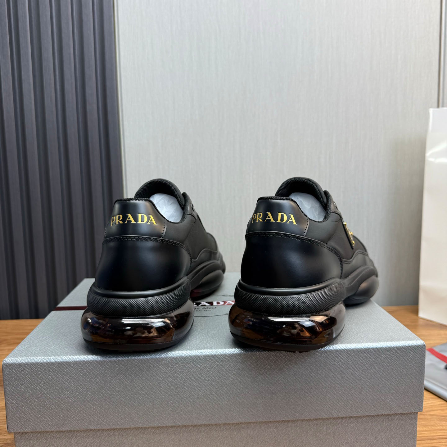Prada Leather Sneakers - FashionPlug