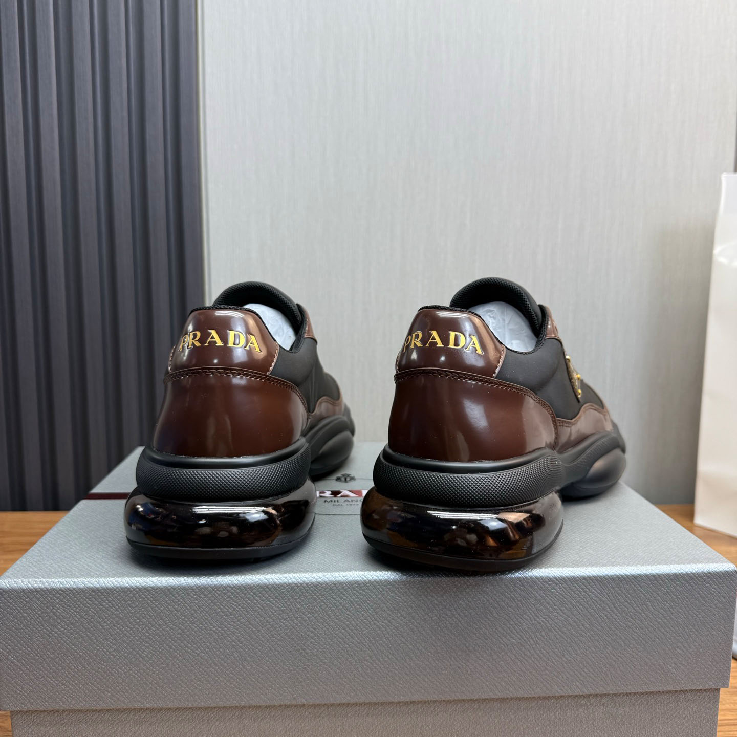 Prada Leather Sneakers - FashionPlug
